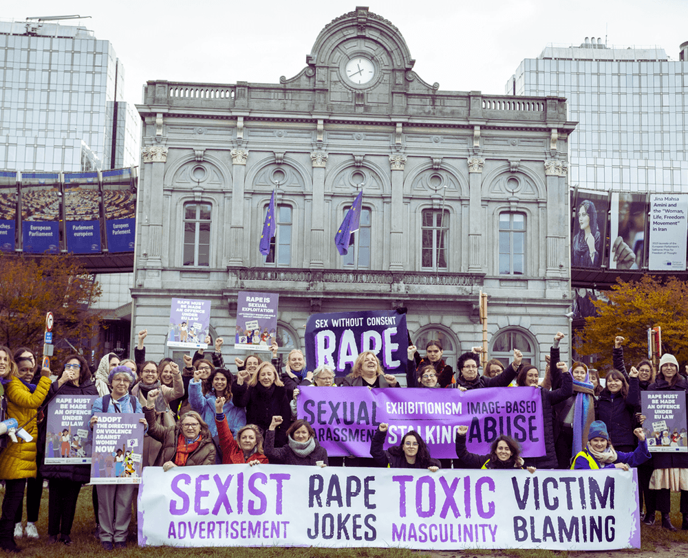 Image of women from all ages protesting peacefully 