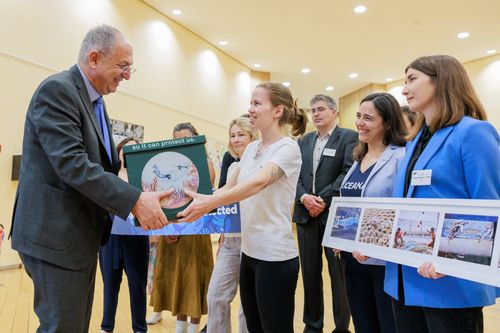 WeMove campaigner delivers the petition signatures to Commissioner Kadis