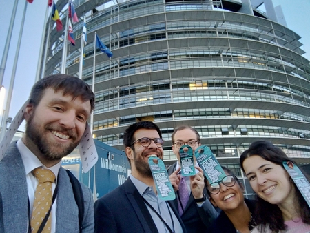 Activists in Strasbourg ready to enter Parliament before the vote to place the door hangers on MEPs' doors