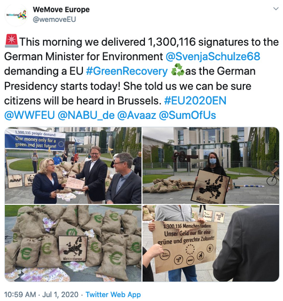 Activists pose with WeMove Europe signs and prop bags of money outside European Parliament